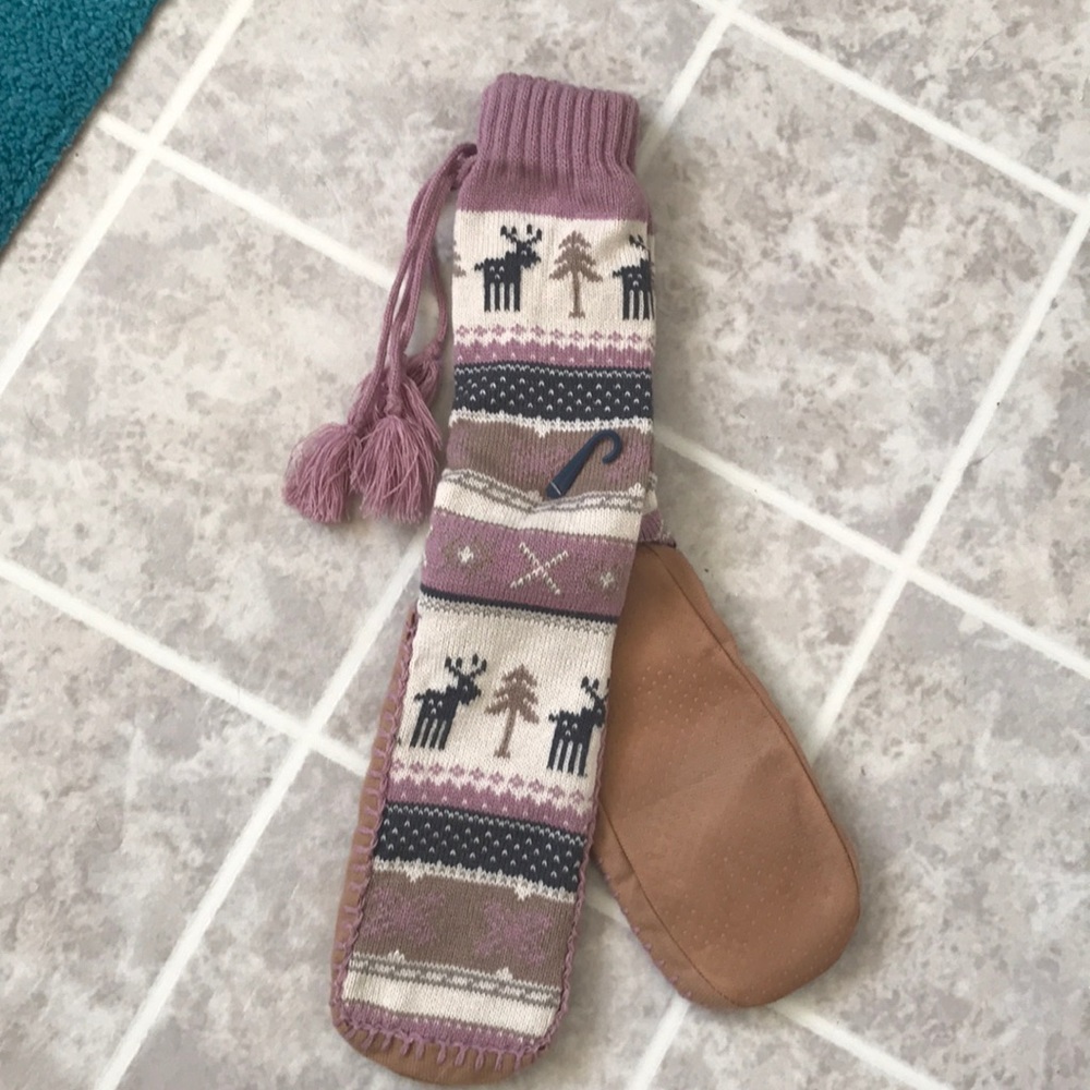 Brand new- never worn slipper boots with tassels.